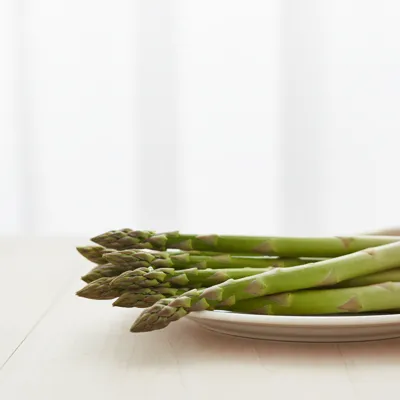 Fresh asparagus spears on a table