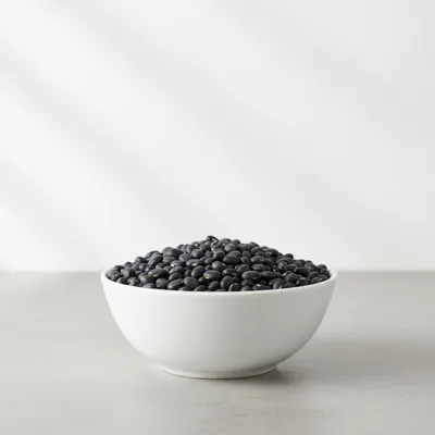 Dry black beans in a bowl
