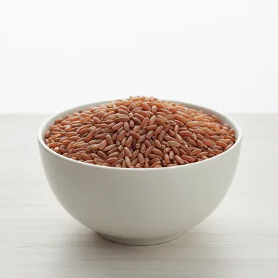 Bowl of uncooked brown rice