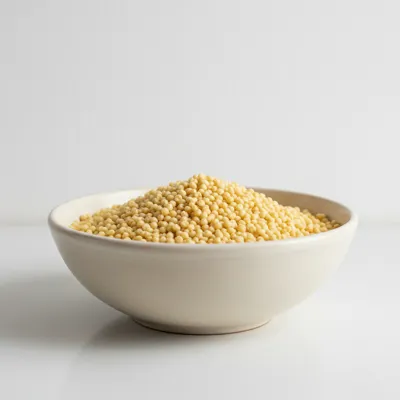 Uncooked couscous in a bowl