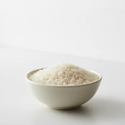 Uncooked white rice in a bowl