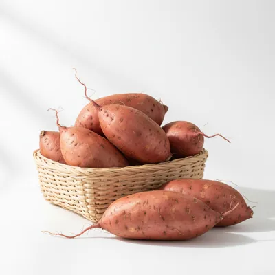 Fresh sweet potatoes in a basket
