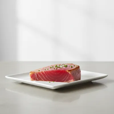 Raw tuna steak on a plate